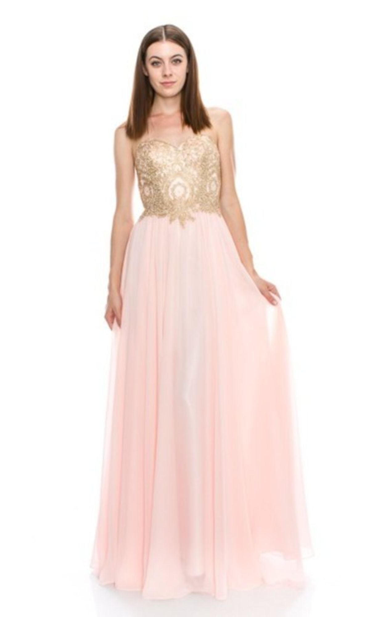 A woman wears the Lace-Up Strapless Long Prom Dress: Chicas C0533, featuring a gold-embroidered bodice and a flowing light pink skirt, standing against a plain white background.